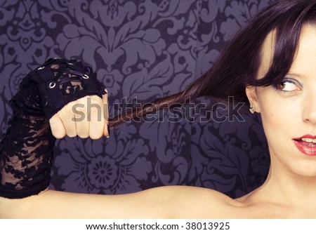 Half face woman portrait with crazy face expression on stylish wallpaper