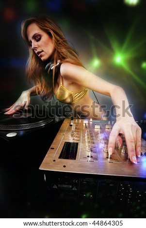 stock-photo--beautiful-dj-girl-on-decks-on-the-party-44864305.jpg