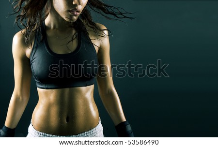 stock photo : sexy brunette fitness wet woman after workout