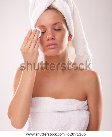 stock photo Portrait of a blonde model cleaning makeup