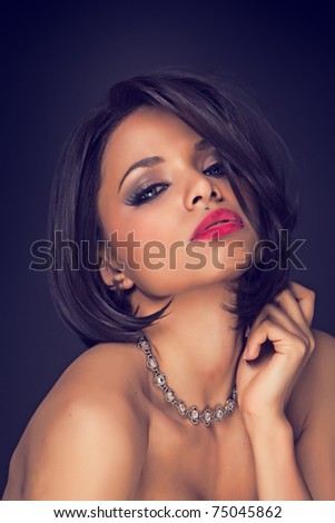 sexy brunette elegant model portrait wearing neckless