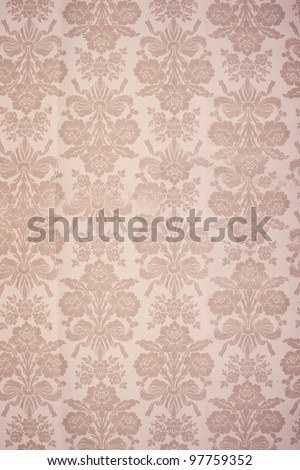 Vintage beige coloured floral wallpaper background with bouquets of flowers in rows