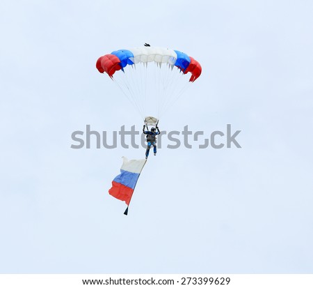 ROSTOV REGION, RUSSIA - APRIL 18: Parachutist with the flag of Russia. International Festival of ecological tourism \