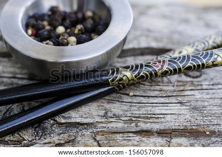 Chinese sticks and spices on old board