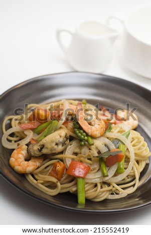 Stir fried spicy spaghetti with seafood