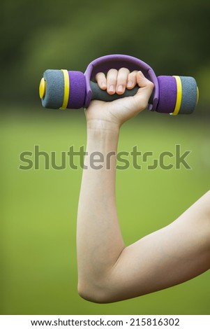 Woman's Hand With Dumbbell