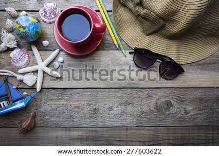 travel planning on wooden background