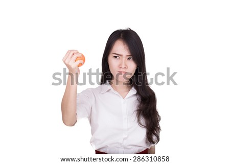 asian woman in stress squeezing a stress ball