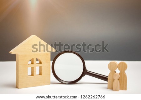 Wooden house and magnifying glass with family. Property valuation. Choice of location for the construction. House searching concept. Search for housing and apartments. Real estate concept. Appraisal