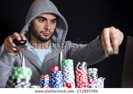 Online poker placing bet metaphor isolated on black