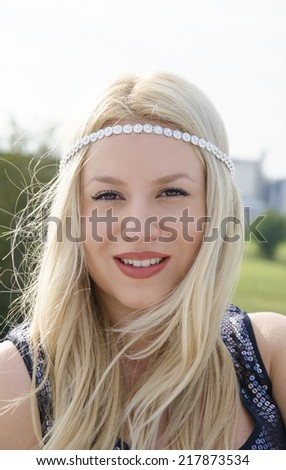 Vogue portrait of beautiful blonde with hair accessories shallow depth of field