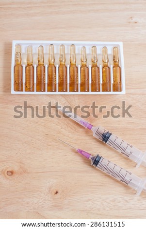 medical ampoule and syringe. Vials of medications