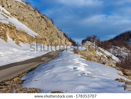 Snow melts in the mountains.(Montenegro, road to Lovcen)