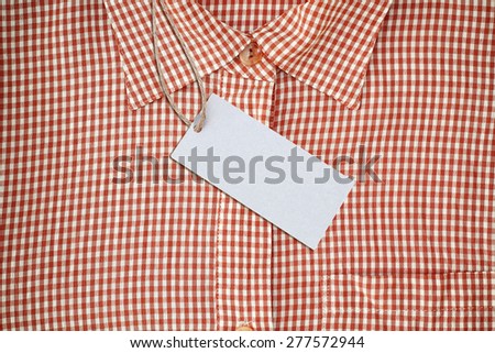 Price tag on a finest-quality shirt - close up