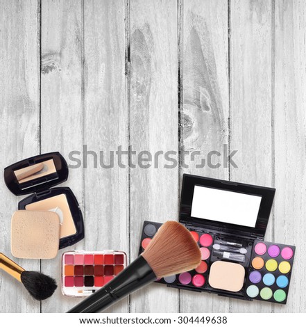 Makeup Eyeliner brush with bottle ,set of cosmetics,Make-up and brushes,powder, puff, mascara, eyeliner on wood table