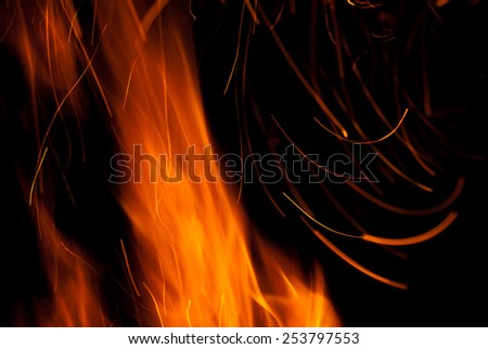 Flame and sparks isolated on black/Flame and sparks