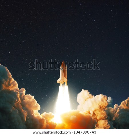 The space shuttle rockets launch into space on the starry sky. spacecraft flies into space with clouds of smoke. Concept