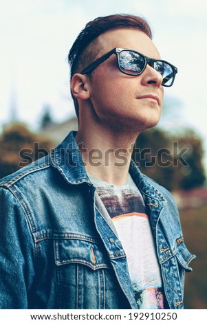 Young man looking at the sky