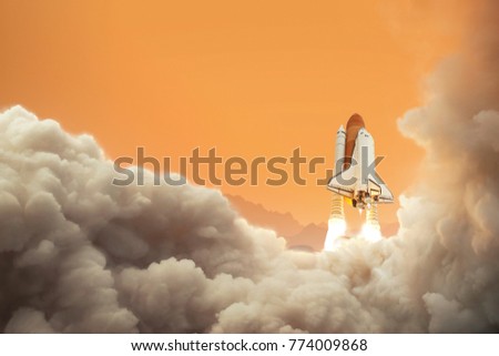 Spaceship on the planet Mars. Rocket takes off on Mars. Space shuttle taking off on a mission.