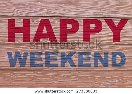 Happy weekend on wooden background