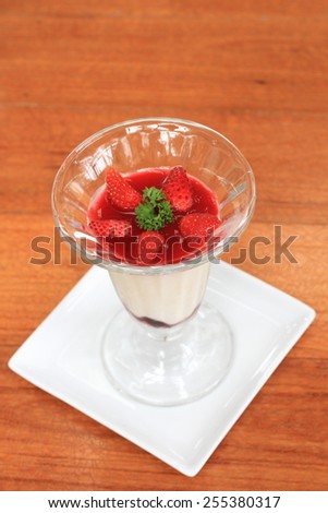 Fruit yogurt cake. Cream and yogurt stawberries