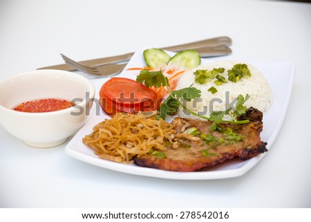 Vietnamese Cuisine - Grilled Pork Chop and Rice with Spicy Fish Sauce (Com Tam Suong Bi)