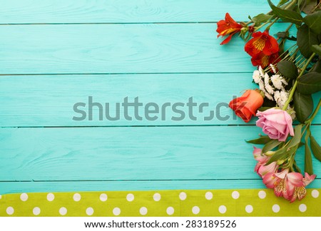 Frame of flowers on the table