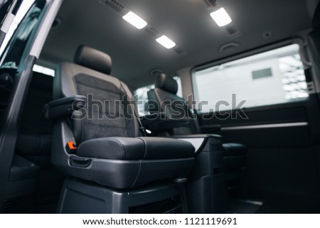 Luxury leather seats in the van. Interior of luxury minivan.