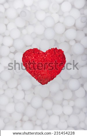 Beautiful winter poster with love red heart. Ice. Snow. Cold. Warm. Merry Christmas. Valentine\'s Day.  New Year. Abstract light snowfall pattern background.