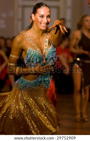 SAINT-PETERSBURG, RUSSIA - JUNE 12: Young woman at dancing pose at ballroom dance competition on June 12, 2008 in Saint-Petersburg, Russia. 