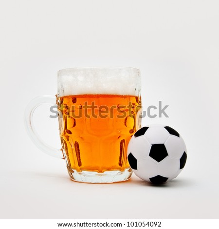 Beer jug and small soccer ball