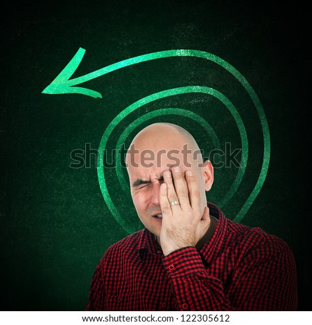 Memory loss, portrait of adult bald man trying to remember something, hand on face.