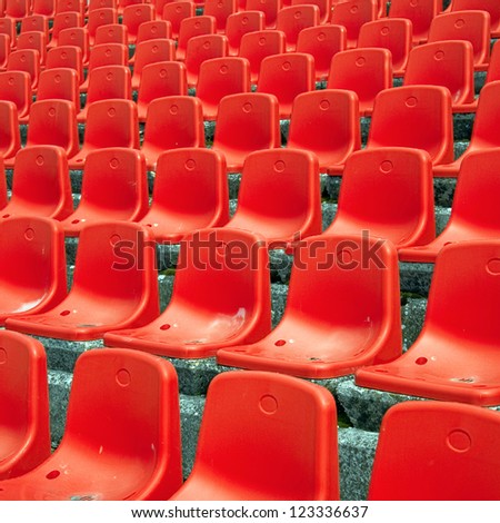 Empty stadium seats at open air sports arena.