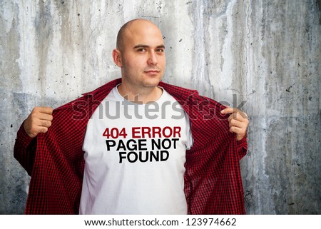 404 error on web designer\'s t-shirt. Man showing his white t-shirt with 404 error message