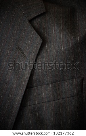 Business suit pocket, close up.