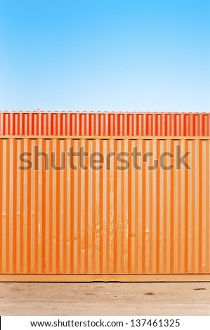 Train cargo containers. Orange metal transport container texture.