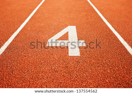 Number four on athletics all weather running track