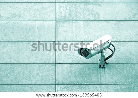 CCTV camera. Security camera on the wall. Private property protection.