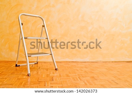 Aluminum ladder in the room, useful for housework.