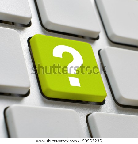 Computer keyboard with question mark key.