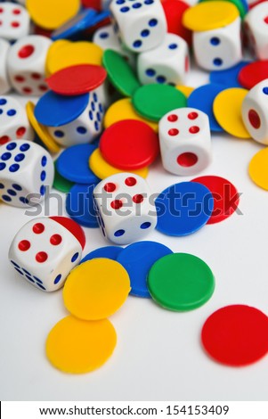 Dice. Plastic dice pile as board game or gambling concept.