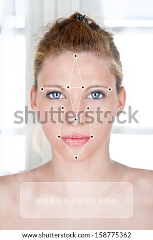 Face detection software recognizing a face of beautiful young woman