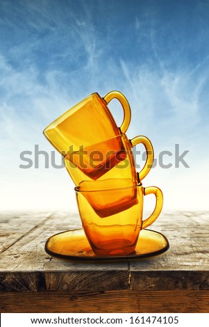 Empty glass mugs on wooden table