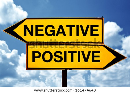 Negative versus positive, opposite direction signs on the street