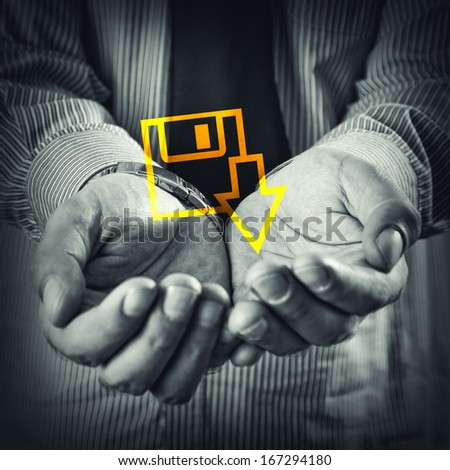 Open hands of a man with file download icon.