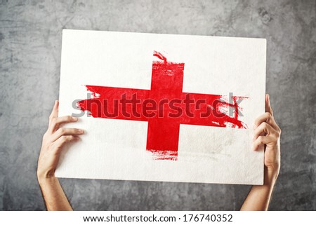 England flag. Man holding banner with English Flag. Supporting national team, patriotism concept.