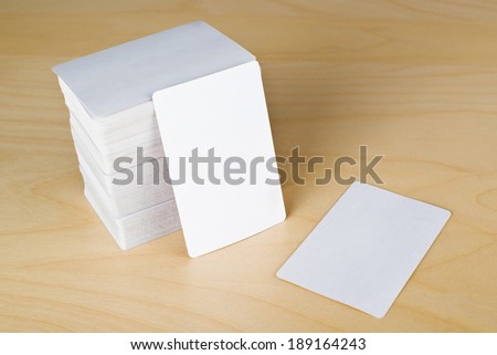 Business cards with rounded corners. Stack of blank vertical business cards propped up another with copy space for your design. Please, browse my portfolio for more blank business cards images.