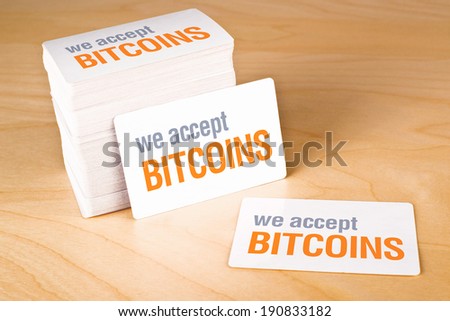 We accept bitcoins Business cards with rounded corners. Stack of blank horizontal business cards propped up another.