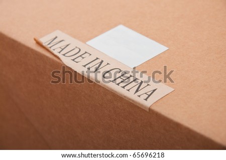 Made in China label. Cardboard package box with paper label \