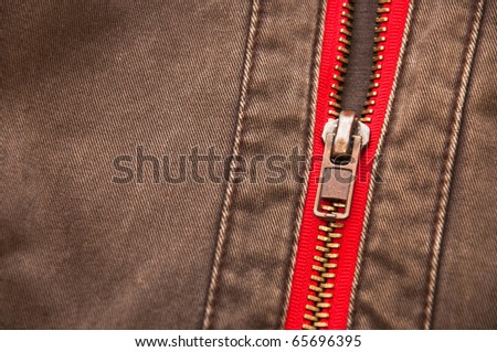 Zipper on a brown wind jacket